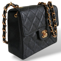 Bolsa Chanel Mini Flap Preta em Couro Caviar e Ferragens Douradas