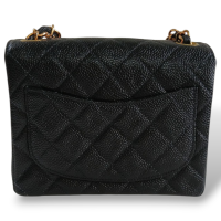 Bolsa Chanel Mini Flap Preta em Couro Caviar e Ferragens Douradas