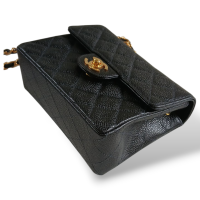 Bolsa Chanel Mini Flap Preta em Couro Caviar e Ferragens Douradas