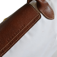 Bolsa Longchamp Le Pilage Pequena Off White com Caramelo