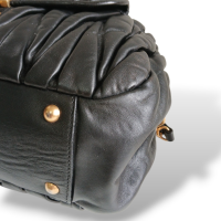 Bolsa Miu Miu Matelassê Preta