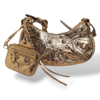 Bolsa Balenciaga Le Cagole XS Dourada