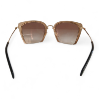 Óculos Miu Miu SMU52R 