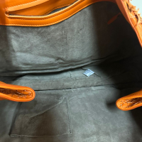 Bolsa Bottega Veneta Intrecciato Laranja