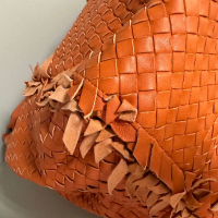 Bolsa Bottega Veneta Intrecciato Laranja