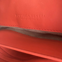 Bolsa Bottega Veneta Intrecciato Olímpia Laranja