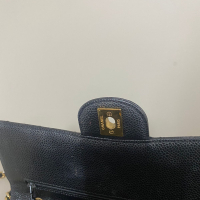 Bolsa Chanel Double Flap Medium Caviar Preta