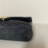 Bolsa Chanel Double Flap Medium Caviar Preta