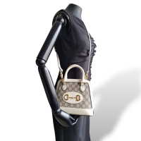Bolsa Gucci Horsebit em couro e canvas