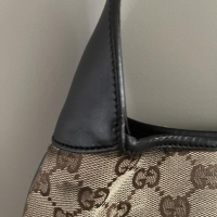 Bolsa Gucci Jackie Lobo Monograma