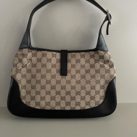 Bolsa Gucci Jackie Lobo Monograma