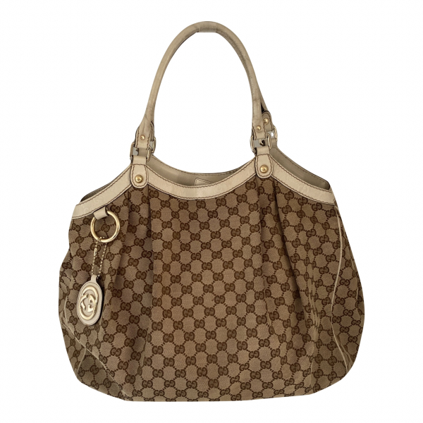 Bolsa Gucci Sukey Medium Monograma