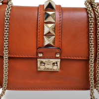 Bolsa Valentino Rockstud Glam Lock Laranja