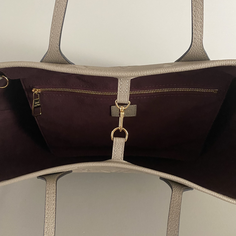 Bolsa Louis Vuitton Neverfull MM Monograma Empreinte Tourtelle Bolsa Louis Vuitton Neverfull MM Monograma Empreinte Tourtelle
