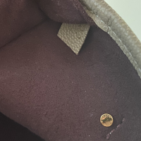 Bolsa Louis Vuitton Neverfull MM Monograma Empreinte Tourtelle