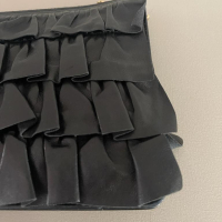 Clutch Chanel preta lambskin babados