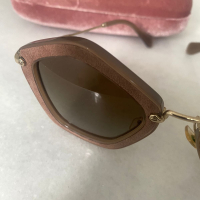 Óculos Miu Miu Nude 