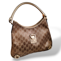 Bolsa Gucci Abbey Monograma GG Dourada