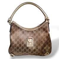 Bolsa Gucci Abbey Monograma GG Dourada