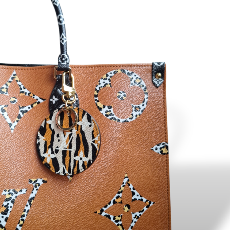 Bolsa Louis Vuitton OnTheGo Jungle Monograma GM Bolsa Louis Vuitton OnTheGo Jungle Monograma GM